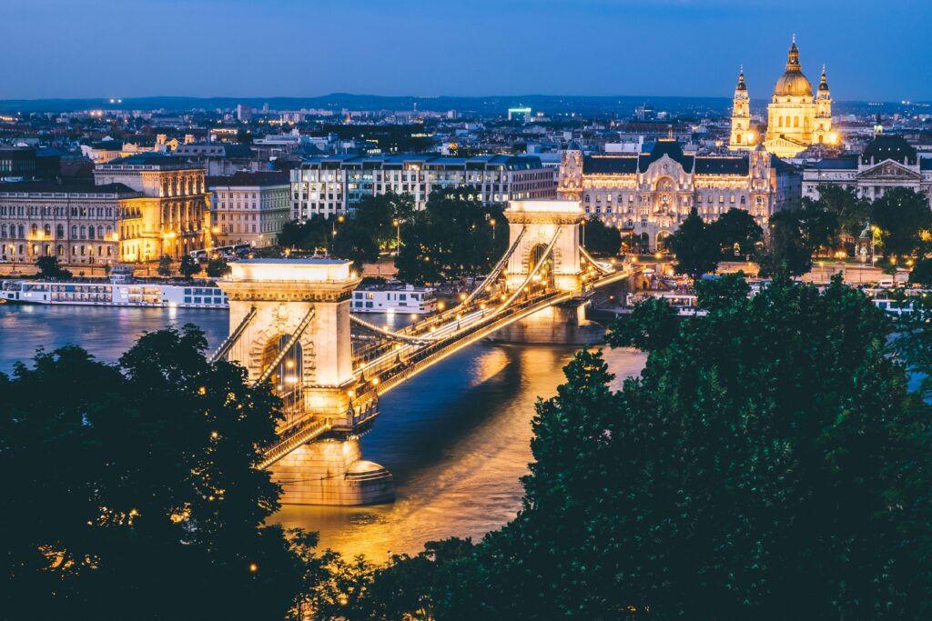 A steamy thermal bath in Budapest under ornate architecture, a value urban travel 2025 retreat