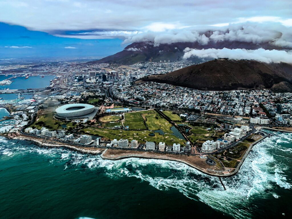 Table Mountain overlooking Cape Town at sunset, a gem for value urban travel 2025