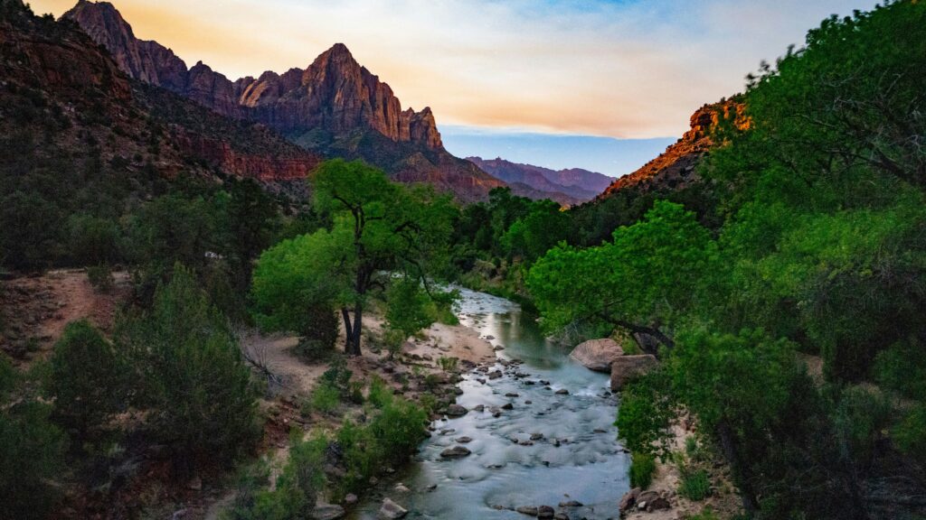 Zion’s Narrows slot canyon with towering red walls, a top value adventure travel 2025 spot.