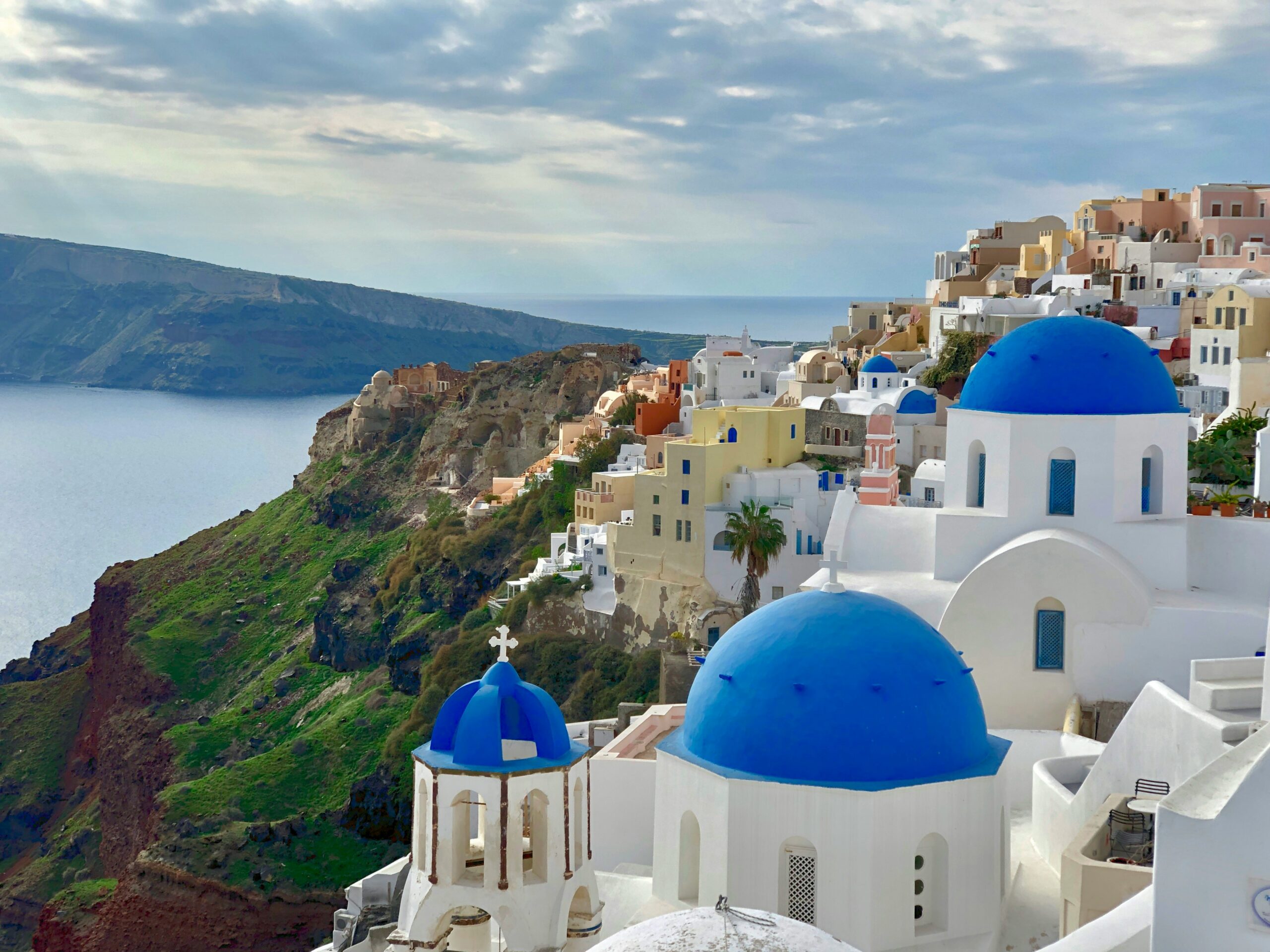 Santorini cliffs and blue domes