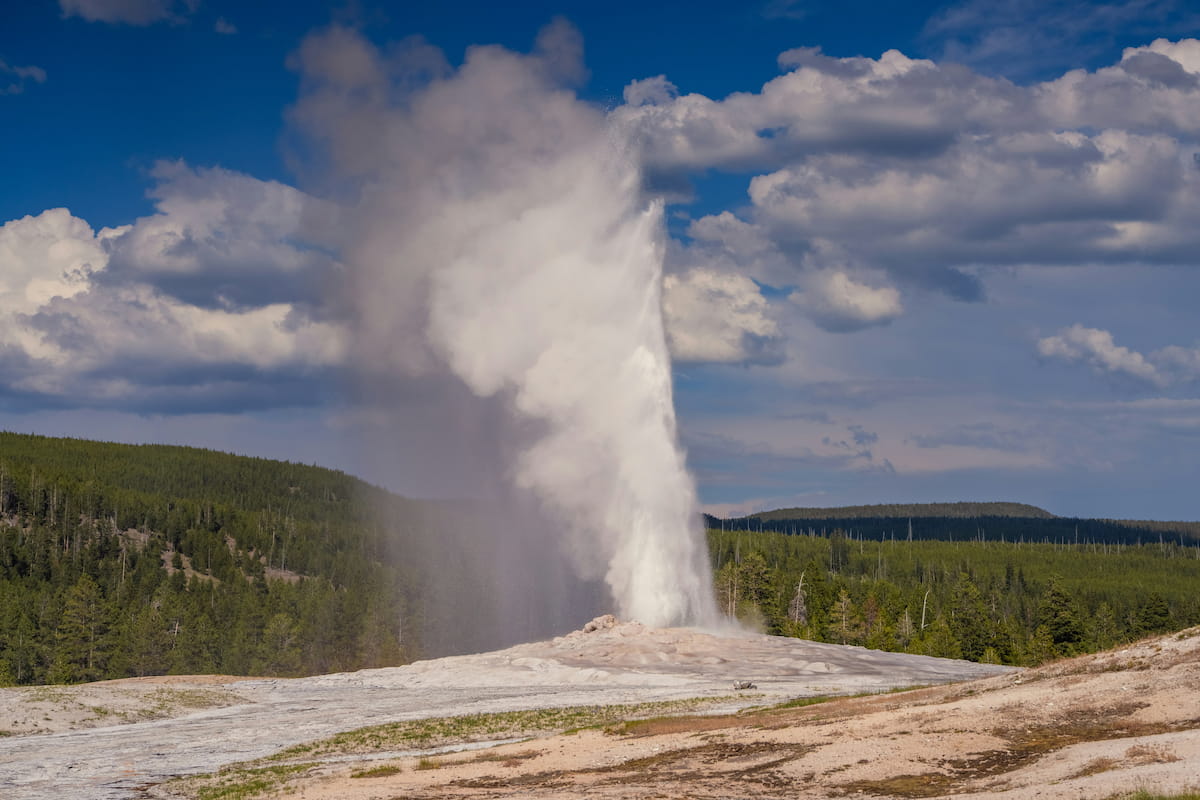 Old Faithful geyser erupting in Yellowstone National Park