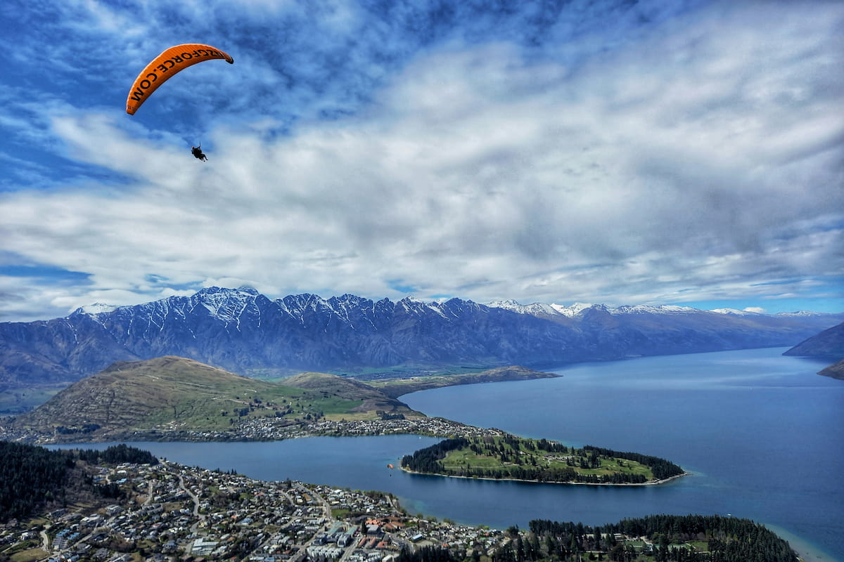 Aerial view of Queenstown on Lake Wakatipu with The Remarkables mountain range in winter, New Zealand