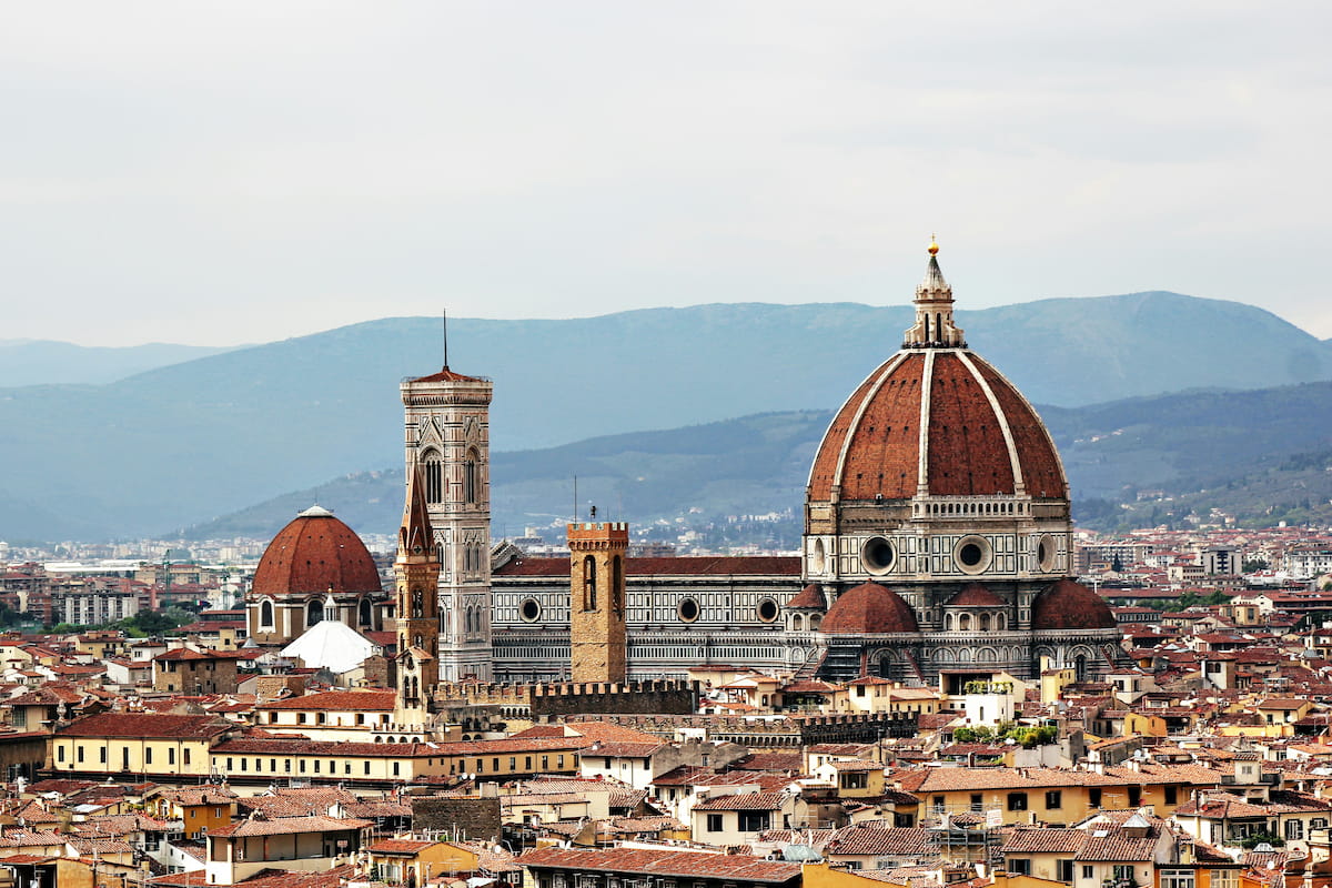 Florence Duomo cathedral and Brunelleschi dome over red rooftops