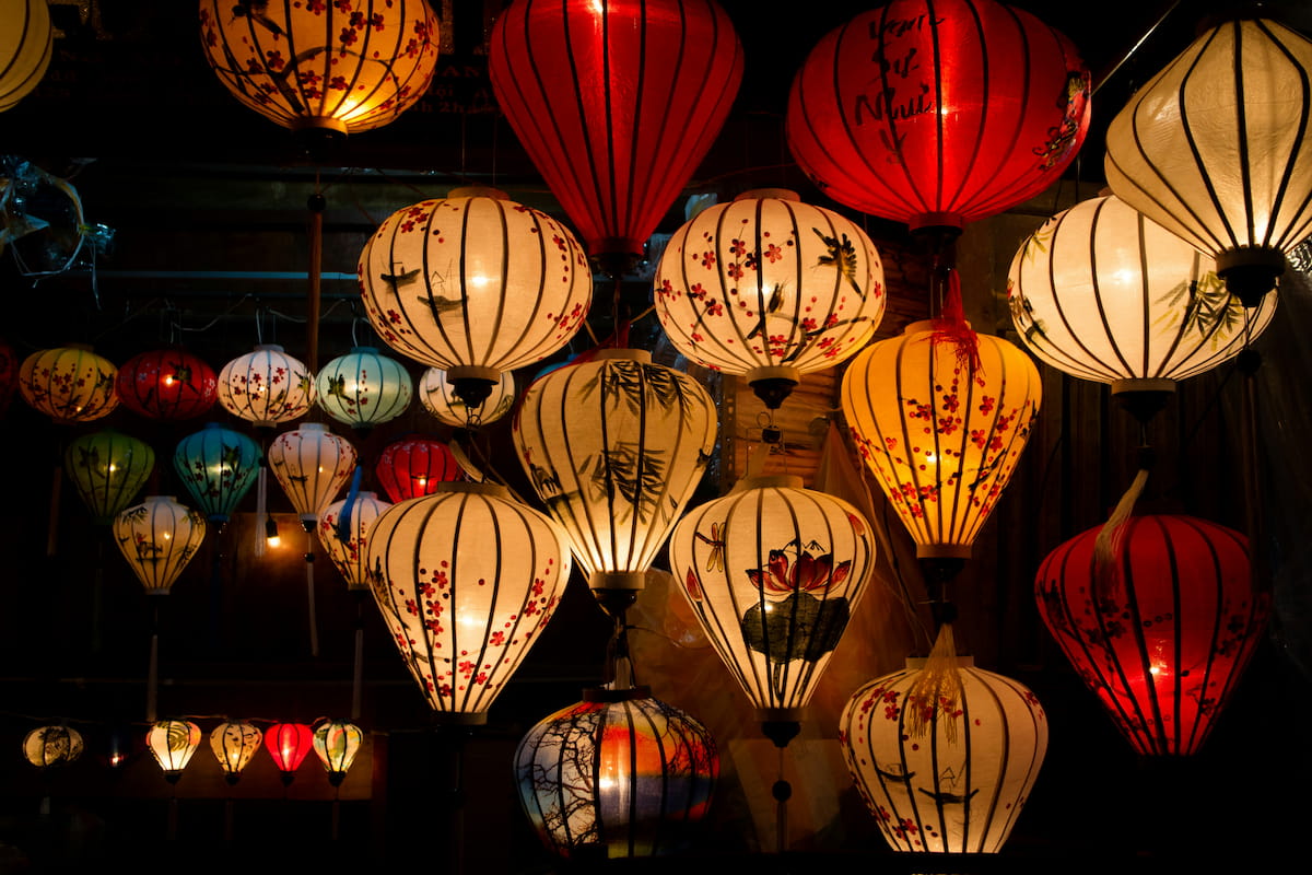 Hoi An Ancient Town colorful lanterns glowing over the Thu Bon River at night